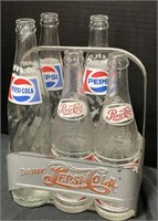 Pepsi-Cola Drink Carrier And Bottles.