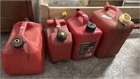 Set of 4 Small Gas Cans.
