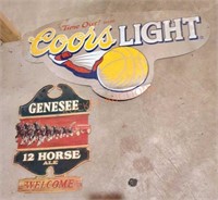 Coors light and Genesee bar signs
