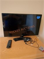 Approximately 24-in LG flat screen TV