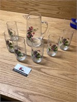 Glass pitcher And glasses with violets