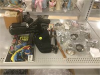 Assorted watches, air soft guns and more.