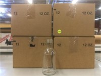 4 boxes New 12oz clear glass bottles.