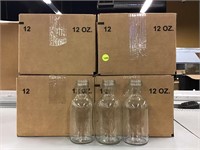 4 boxes 12oz clear glass bottles.