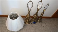 3 brass lamps with 4 shades
