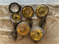 Amber colored fog lights, one clear glass light