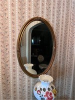Vintage oval gold tone mirror