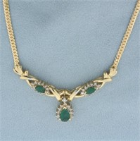 Emerald and Diamond Necklace in 14k Yellow Gold.