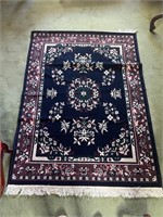 Approximately 3x5 area rug