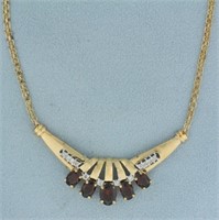 Garnet and Diamond Necklace in 14k Yellow Gold