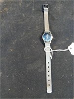 Ladies Larex Quartz watch with leather band.