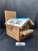 Handcrafted wooden birdhouse