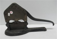 Patented 1914 cast tobacco cutter. Measures: 9" H