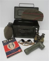 Ammo box with Navy hat, book, goggles,