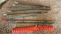 Orange plastic fencing and group of 8 metal t