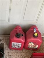 (2) 2 gallon Gas cans both with pour spouts