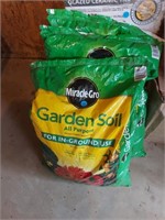 Three bags of Miracle Gro garden soil