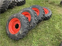 (4) New 10x16.5 Skid steer Tires on New Rims