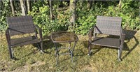 set of oversized rocking lawn chairs and table