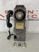 Vintage coin operated pay phone telephone
