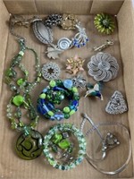 Costume jewelry, mainly brooches with a few