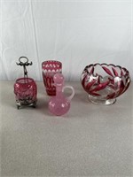 Colored glassware including large bowl, vase,