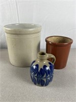 Stoneware crocks. Tallest is approximately 7 1/2