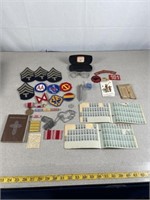 Vintage WWII military badges and pins, ration