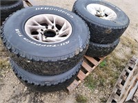 Set of LT295/75R 16 tires w/ 8 bolt rims