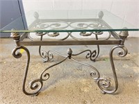 Glass top end table with metal base