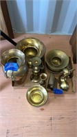 Brass spittoons, figurines, candle holders and