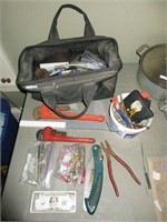 Tool bag, pipe wrenches, drill bits, etc.
