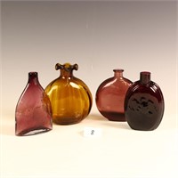 Four art glass bottles, one handblown