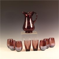 Various amethyst glasses and a Pitcher