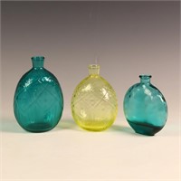 Three art glass bottles
