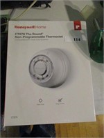 Honeywell thermostat wrapped in box