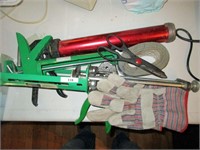 3 caulk guns, gloves, scissor, duct tape