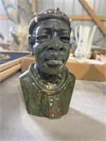African carved stone bust signed