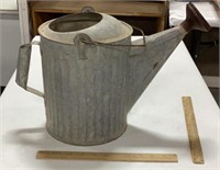 Vintage galvanized watering can