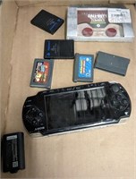 PSP WITH ASSORTED GAMES