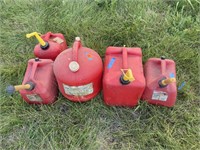 5-various sized plastic gas cans