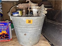 Galvanized bucket, paint sprayer, grease