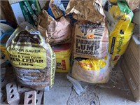 Several bags of Cedar chips, charcoal and more