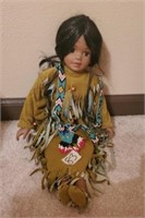 Porcelain Native American doll