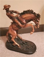 Cowboy and horse figurine