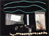 Bag of Bismuth sand, strung beads and more.