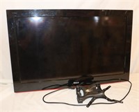 * RCA 32" LCD TV with Wall mount powers on,