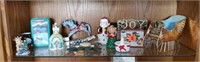 Shelf of Christmas bric brac, decorations