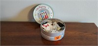 Tin of buttons