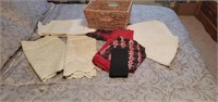Basket of linens, tablecloths, curtains